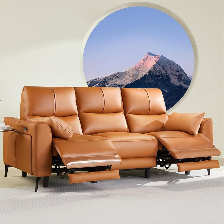 The living room holds an orange leather Italian minimalist power sofa 3 seater sofa