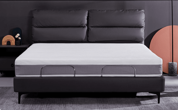 A grey milan smart leather electric bed in the bedroom