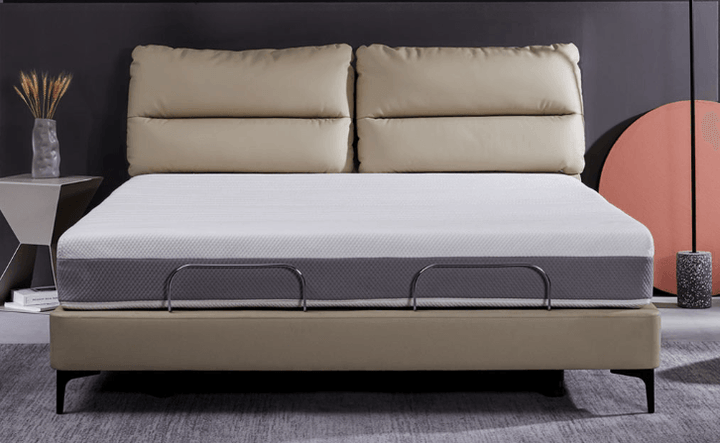 A beige milan smart leather electric bed in the bedroom