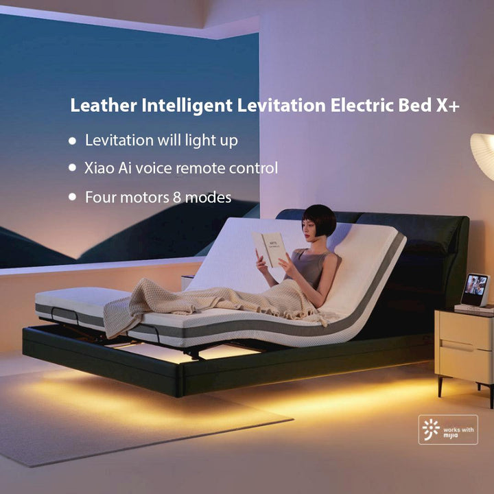 Girl reading a book while lying on the Feel Smart Leather Suspension Electric Bed