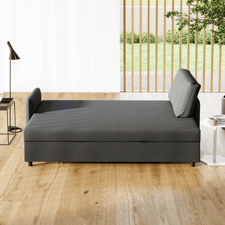 Unfolded grey sofa bed