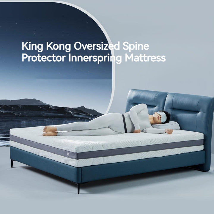 The boy wears a blindfold and sleeps on a King Kong extra-large diameter latex mattress