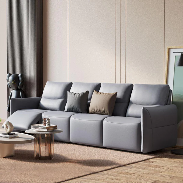 A four-seater gray Cozy smart massage sofa is placed in the bedroom